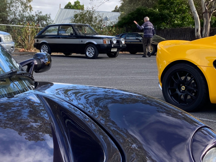 Dave Peters waves off the Bairds steel bodied Lotus